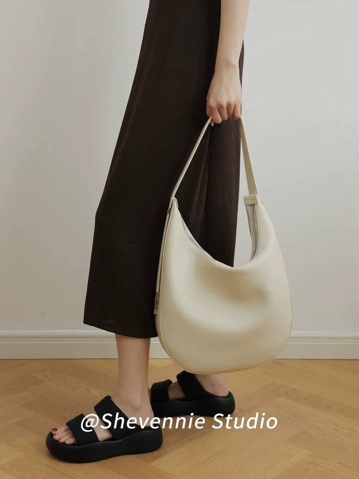 Snow Geinnie Leather Crescent Bag