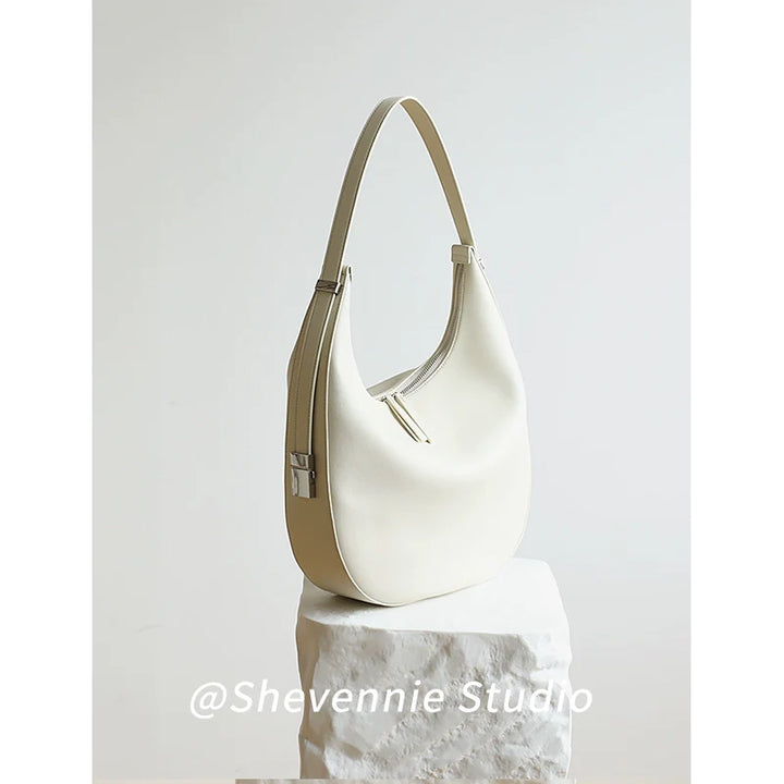 Snow Geinnie Leather Crescent Bag