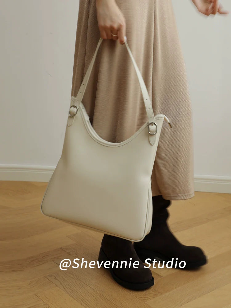 Snow Geinnie Leather Bucket Bag