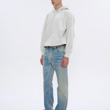 Ice Blue Bootcut Jeans with Washed Distress, Faded Whiskers, and Scratches