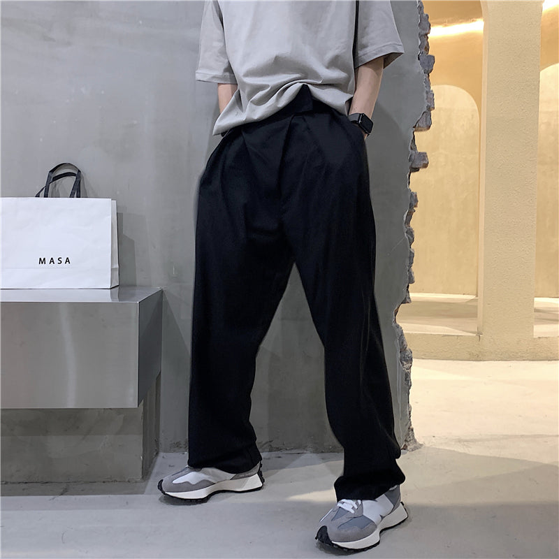 Wide technical plissed pants